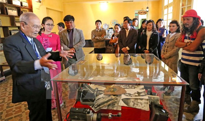 Antique items portraying old Da Lat on display
