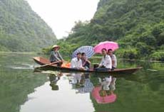 Basking in the unspoilt wild of tranquil Quan Son Lake