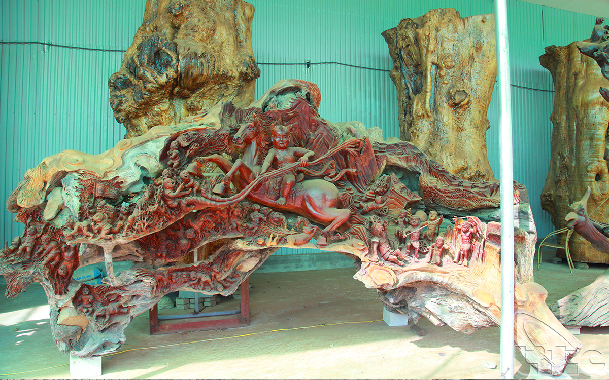 A wooden sculpture in Vietnamese Cultural Space Tourist Site