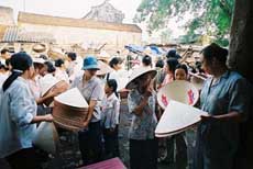 Chilling at the conical hat market